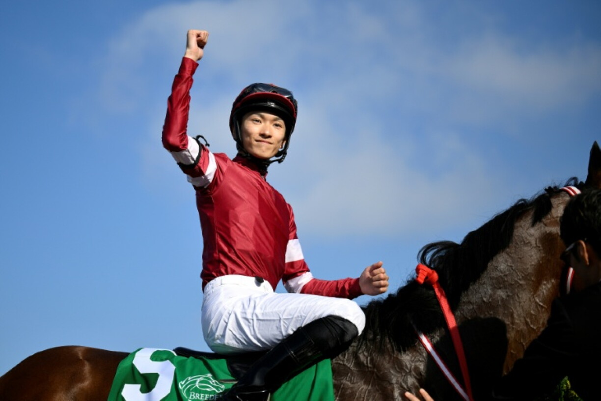 Japanese jockey Ryusei Sakai celebrates aboard Forever Young after winning the 2025 Breeders' Cup Classic at Del Mar in California