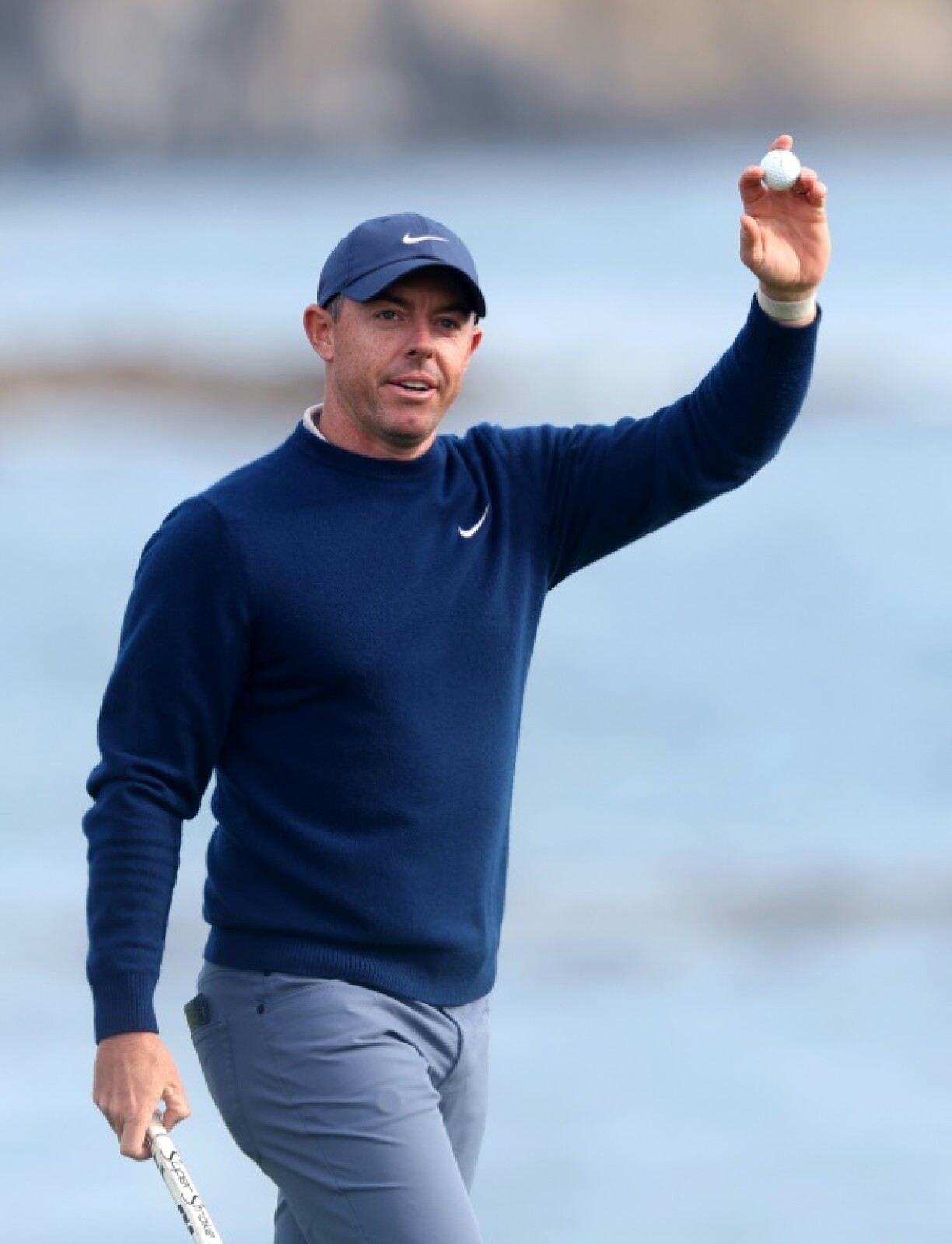 Rory McIlroy of Northern Ireland celebrates winning the PGA Pebble Beach Pro-Am, one of two titles he as captured this year ahead of the Masters