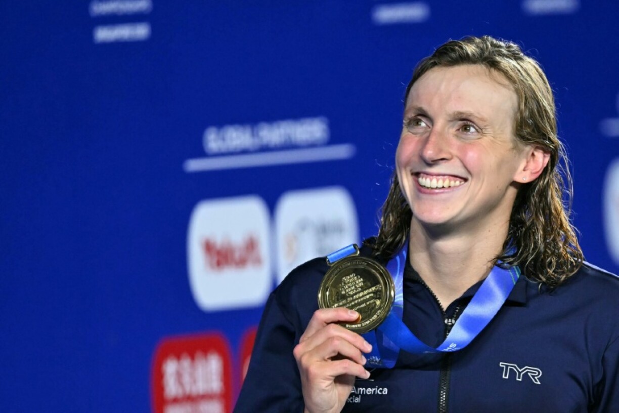 Gold medallist US' swimmer Katie Ledecky celebrates on the podium of the women's 800m freestyle