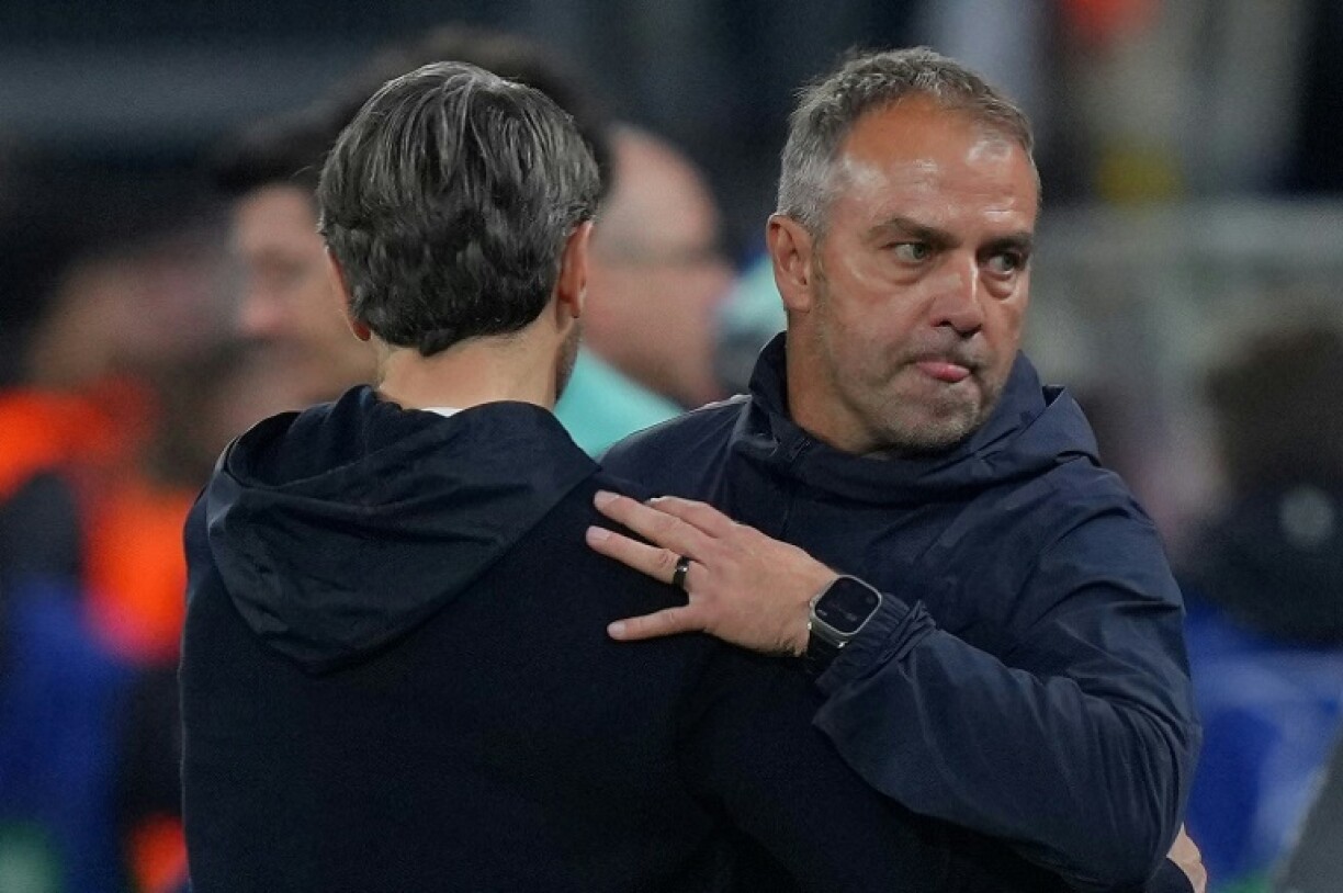 Barcelona coach Hansi Flick (R) said his side's spot in the semi-finals was