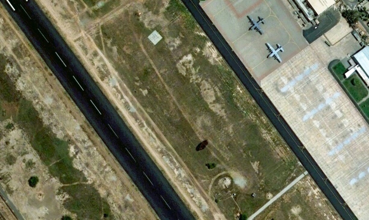A handout satellite image courtesy of Maxar Technologies shows Pakistan Air Force base Mushaf in Sargodha, Pakistan, apparently showing damage from an Indian strike