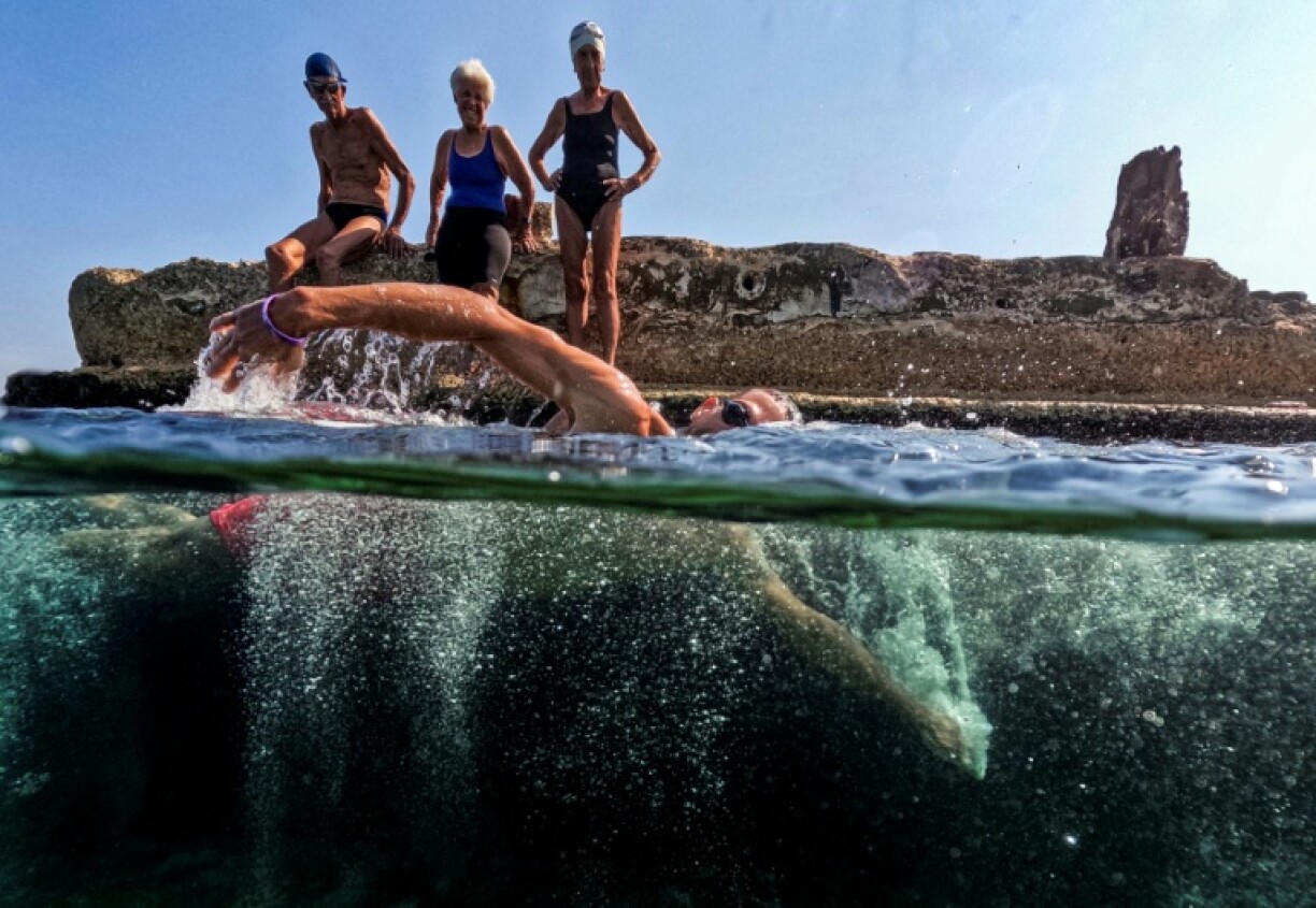 Cuban seniors take the plunge to fight the effects of ageing with Havana's Juventud Acumulada (Forever Young) club