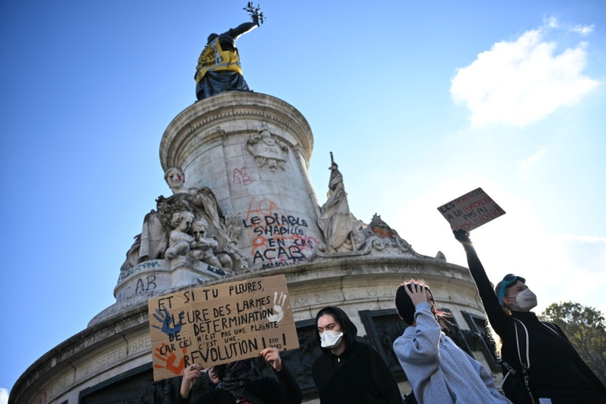 Protesters returned Sunday to the Paris square where there clashes with police