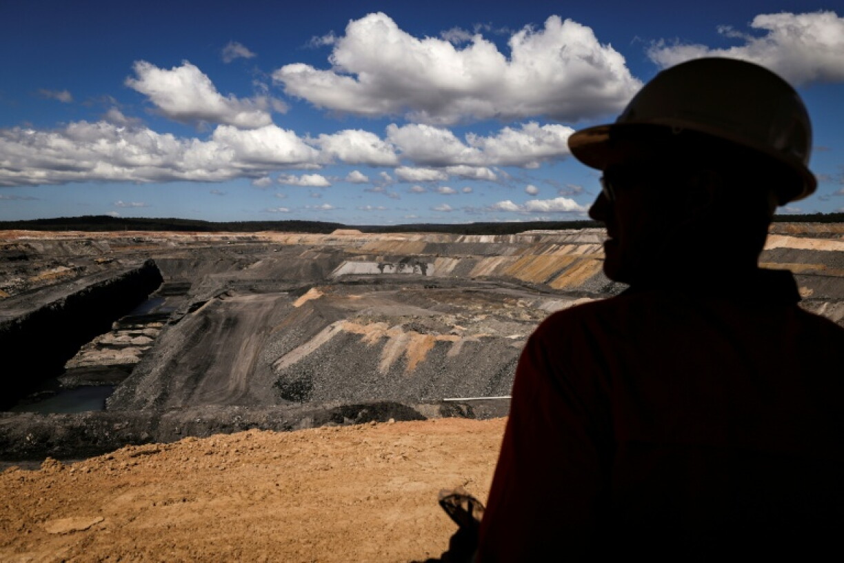 An official looks at the Moolarben coal mine, north of the town of Mudgee in the New South Wales coalfields