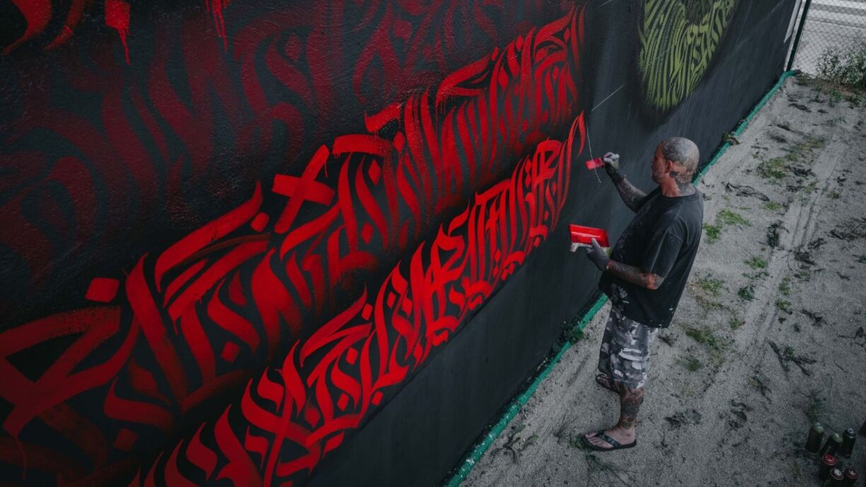 Luxembourg grafiti artist REID painting the wall during his residency at the 'LE MUR' project.