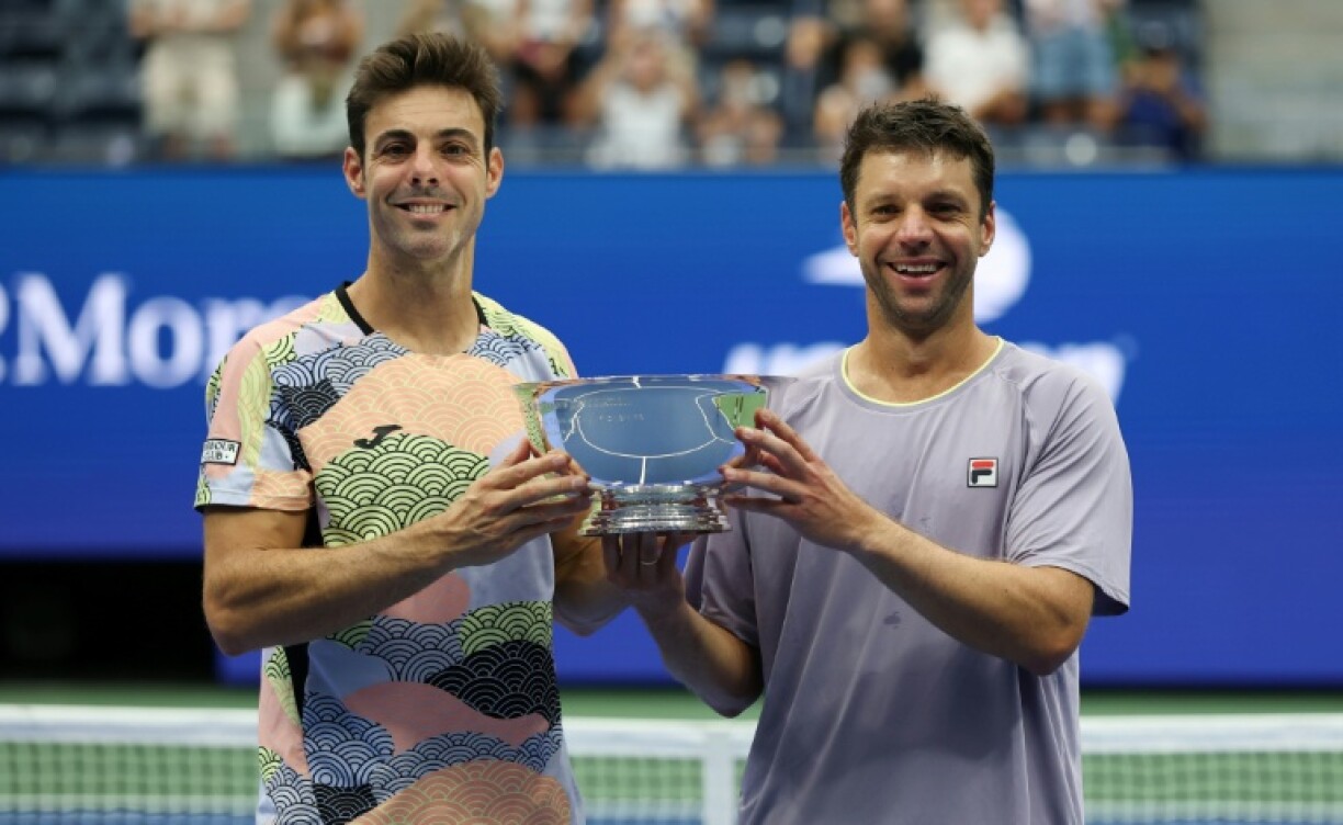 Spain's Marcel Granollers (L) and Argentina's Horacio Zeballos won their second Grand Slam doubles title together at the US Open