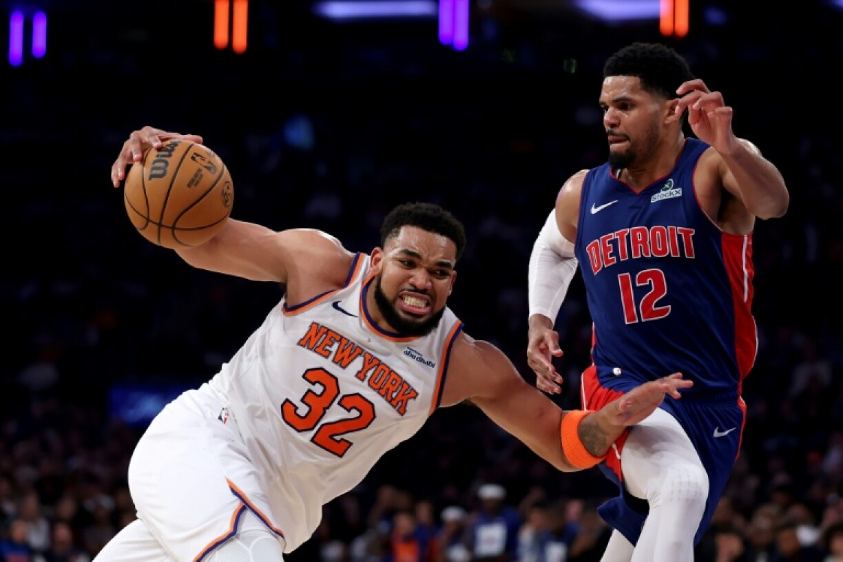 Karl-Anthony Towns of the New York Knicks drives to the basket against Tobias Harris in the Knicks' victory over the Detroit Pistons in game one of their NBA Eastern Conference playoff series