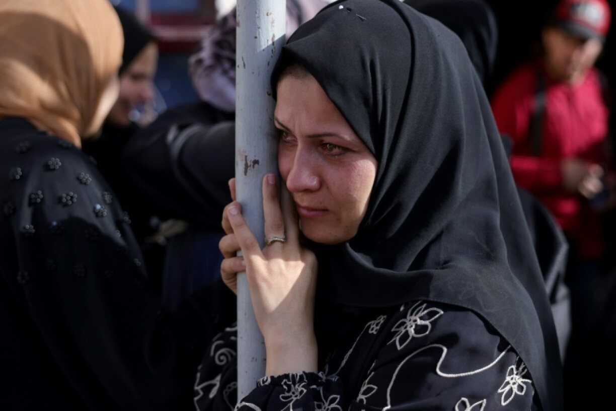 A Palestinian woman mourns the death of loved ones killed in Israeli strikes on Jabalia