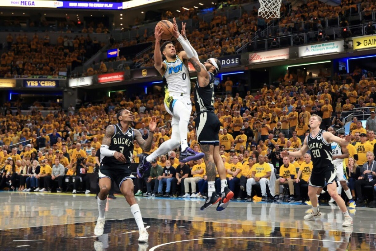 Tyrese Haliburton drives to the basket in Indiana's overtime victory over Milwaukee