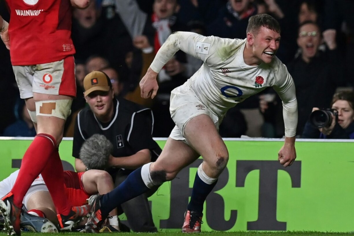 Test return: England centre Fraser Dingwall (R), pictured scoring a try against Wales in last year's Six Nations, has been recalled to face Italy at Twickenham