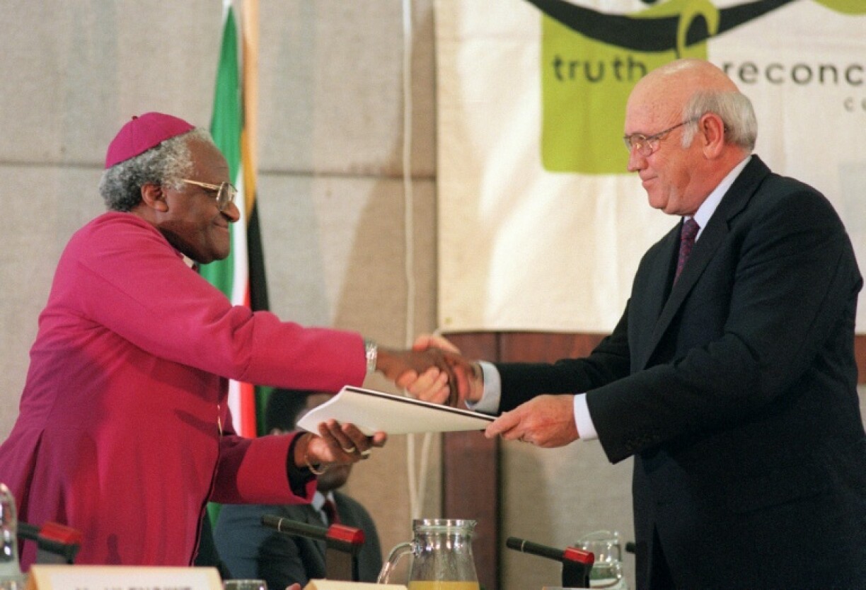South Africa's last white president, FW de Klerk (right), made submissions to the commission led by Archbishop Desmond Tutu
