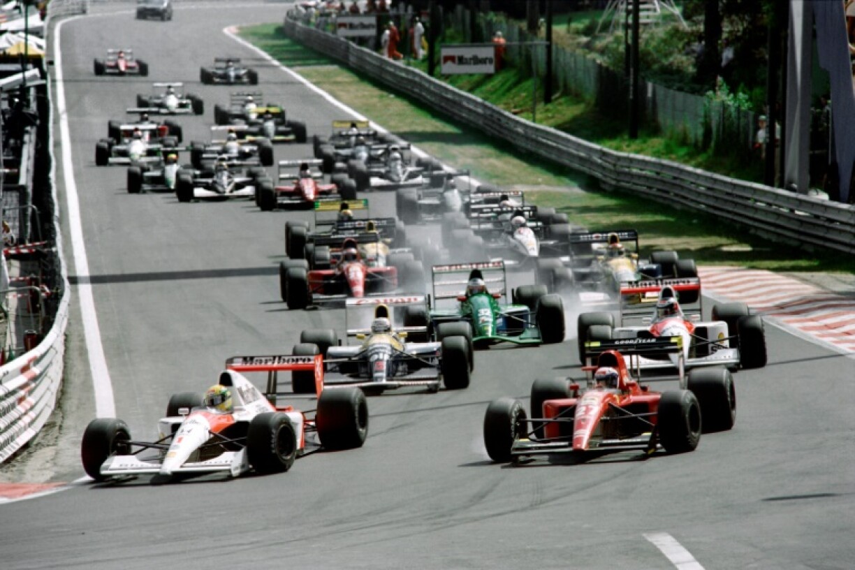 Michael Schumacher on his F1 debut in a Jordan (third right, green) at the 1991 Belgian Grand Prix at Spa-Francorchamps
