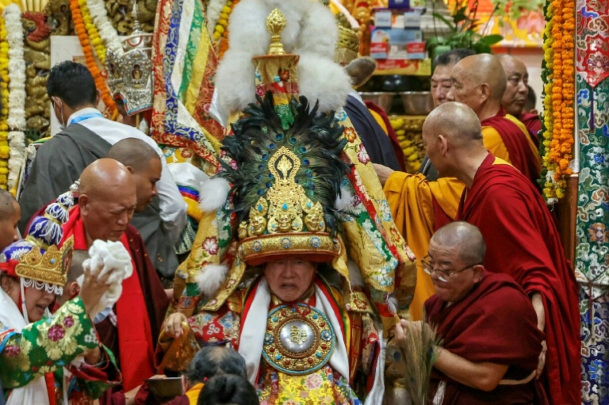 An oracle was among the faithful attending a prayer ceremony as part of celebrations to mark the Dalai Lama's 90th birthday