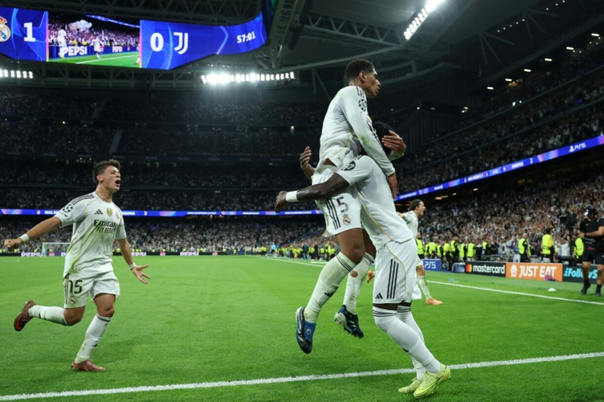 Real Madrid's English midfielder Jude Bellingham celebrates scoring the winner against Juventus in the Champions League