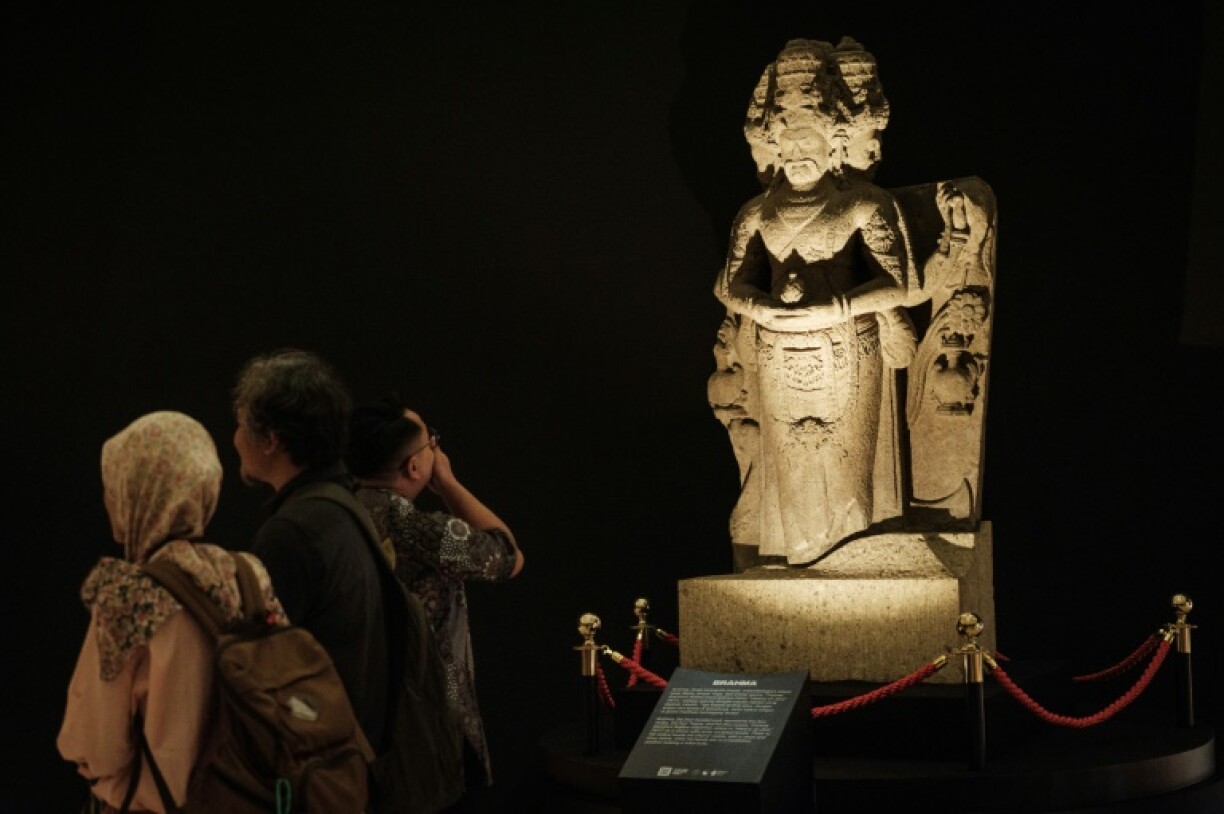 A recently repatriated statue of Brahma, the four-headed deity, is displayed during the reopening ceremony at Indonesia's National Museum