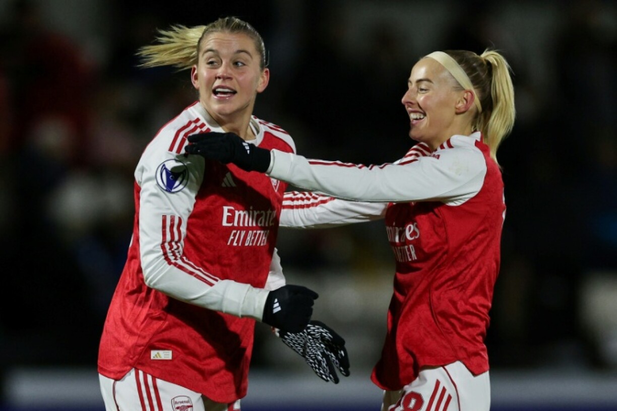 England striker Alessia Russo (L) got both goals for Arsenal in their win over Real Madrid