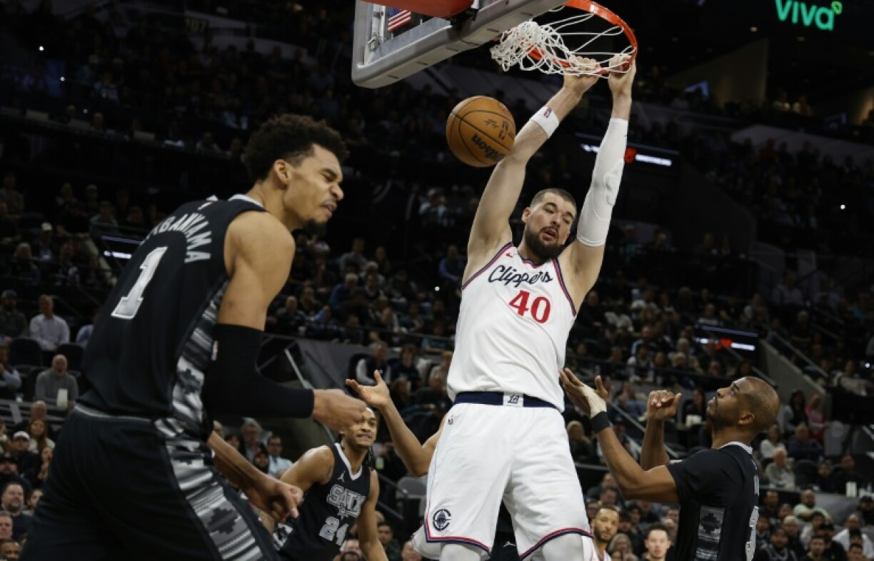 Ivica Zubac of the Los Angeles Clippers dunks in the Clippers' NBA victory over the San Antonio Spurs