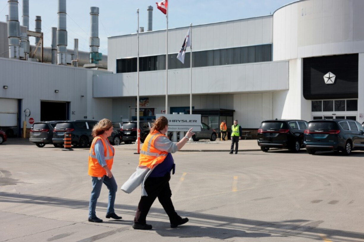 Workers outside the Stellantis assembly plant in Windsor, Canada