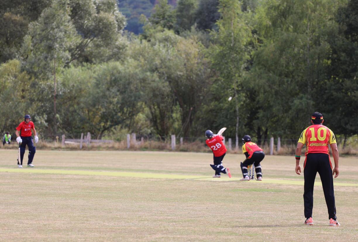 Luxembourg's Vikram Vijh hits a 6 against Belgium