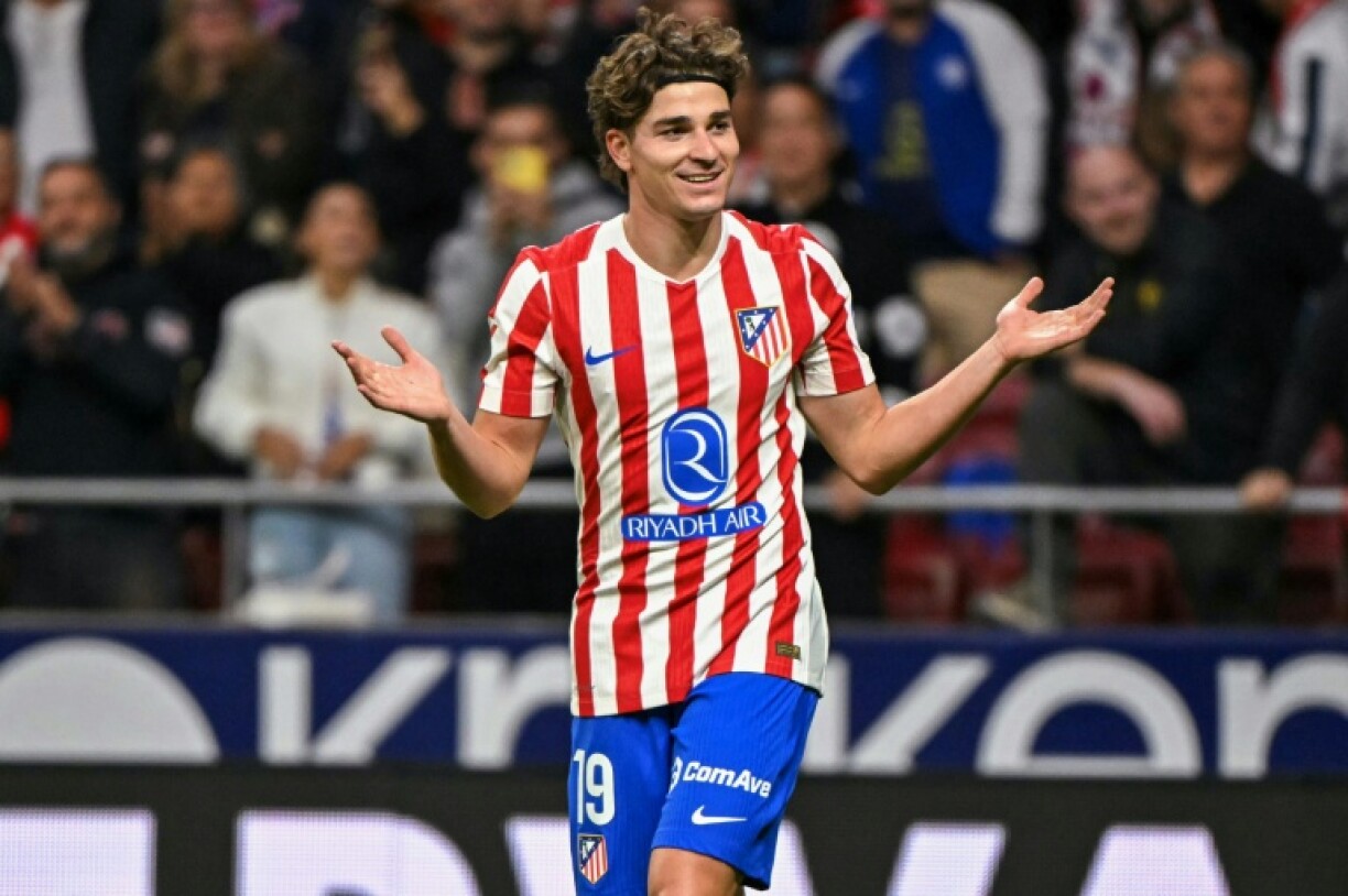 Atletico Madrid's Argentine forward Julian Alvarez celebrates after scoring his and the team's third goal against Rayo Vallecano