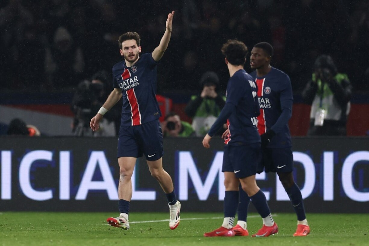 Khvicha Kvaratskhelia celebrates after scoring his first Paris Saint-Germain goal in the 4-1 win over Monaco on Friday