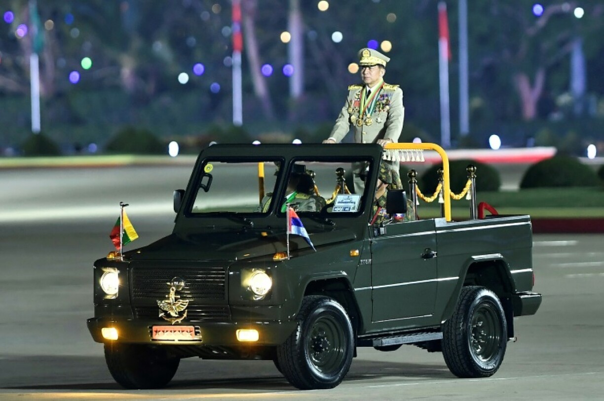 Myanmar's junta chief Min Aung Hlaing arrives to deliver a speech during a ceremony to mark the country's Armed Forces Day in Naypyidaw on March 27 last year