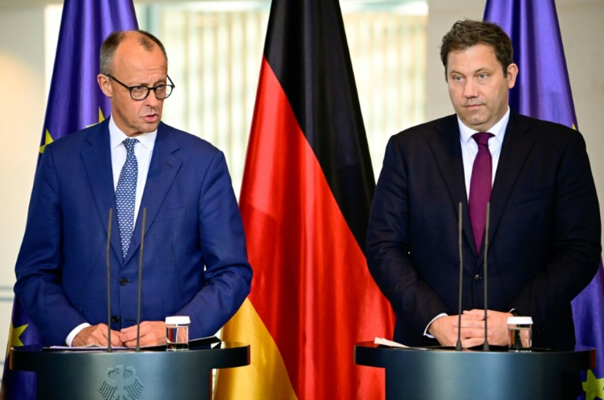 German Chancellor Friedrich Merz and German Finance Minister Lars Klingbeil at a meeting to help the struggling steel sector