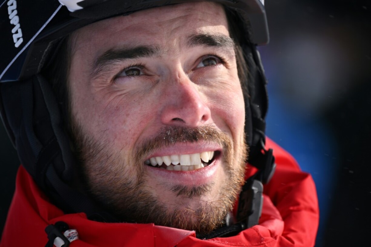 Le Français Kevin Rolland attend son score à la finale de half-pipe des JO de Pékin, achevée à la 6e place, à Zhangjiakou, le 19 février 2022