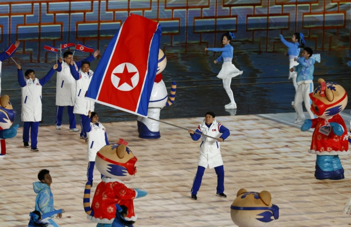 North Korea's delegation enters the arena during the opening ceremony of the 2025 Asian Winter Games in Harbin in northeast China