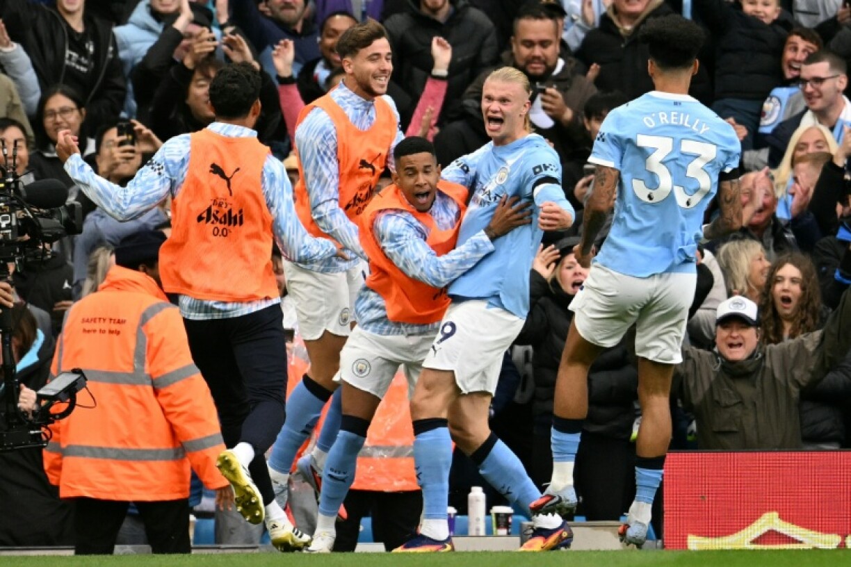 Erling Haaland (2nd R) took centre stage with a second-half double as City bounced back from two consecutive Premier League defeats