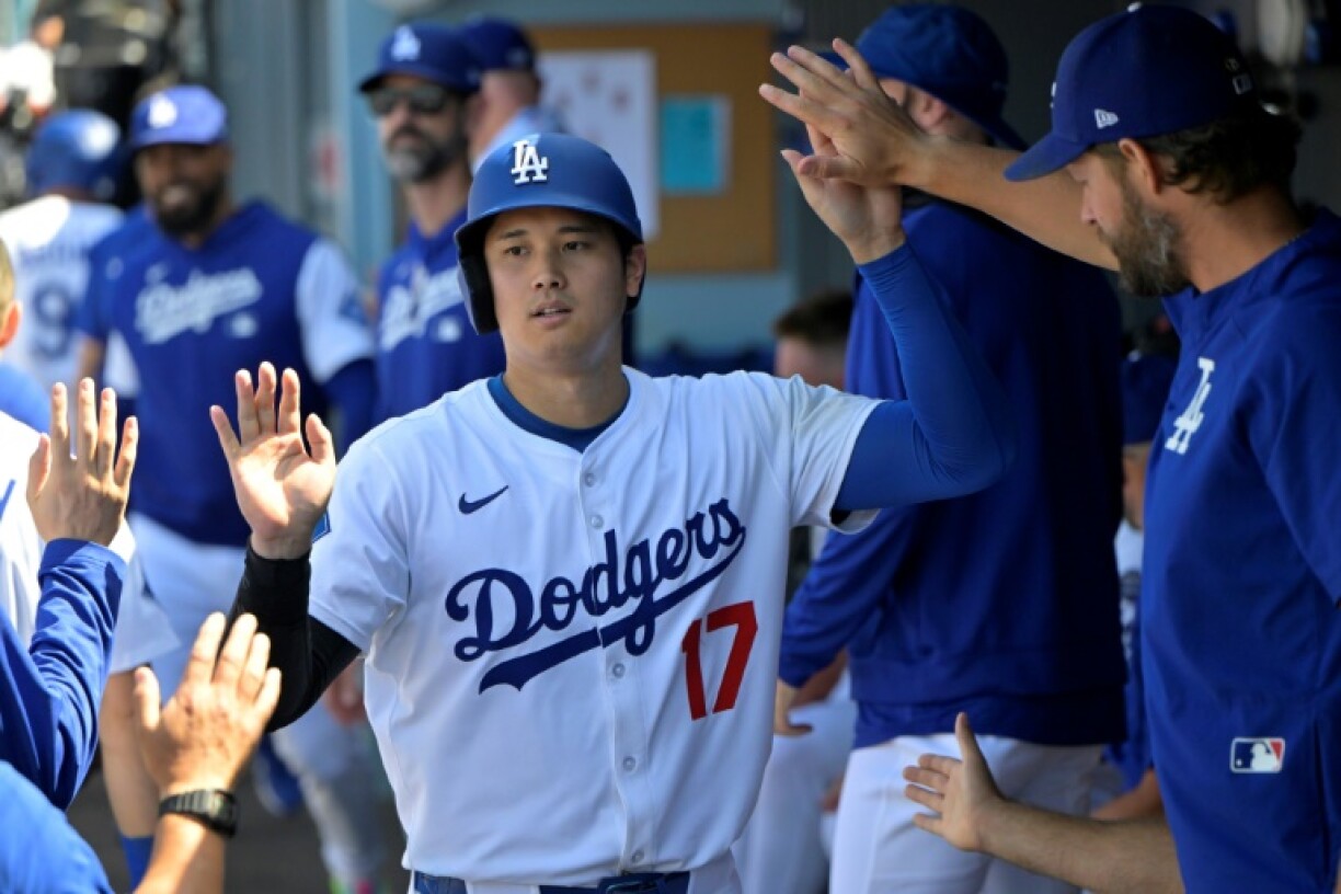 Shohei Ohtani is congratulated by team-mates after a two-run home run in the Los Angeles Dodgers win over the Washington Nationals