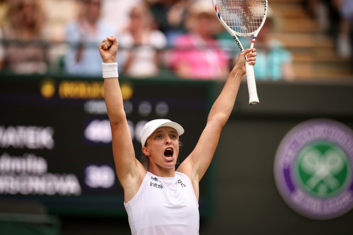 Poland's Iga Swiatek celebrates reaching the Wimbledon semi-finals