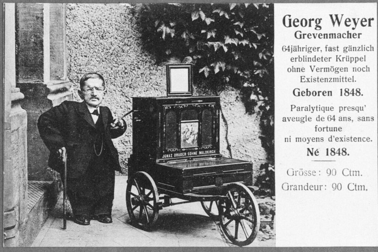 Another one of Georgely's post cards. He stands next to his 'Ignaz Bruder Söhne' barrel organ and is claimed to be 90 cm tall.