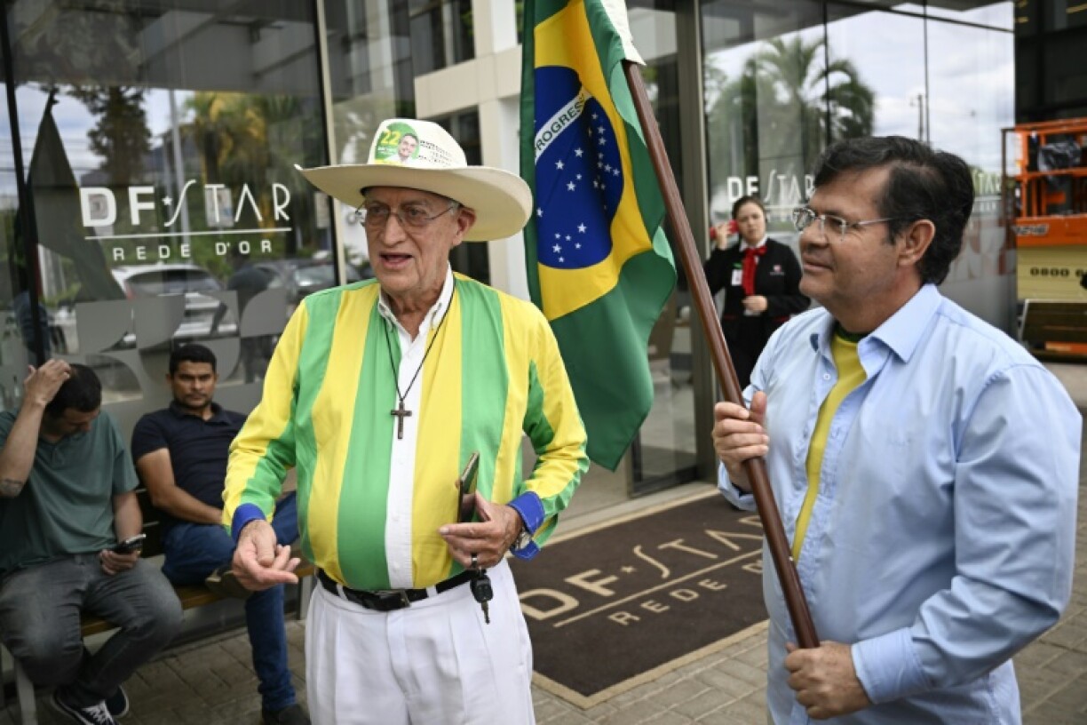 About a dozen supporters of former Brazilian President Jair Bolsonaro gathered at the entrance of the DF Star private clinic, where the ex-president was being treated