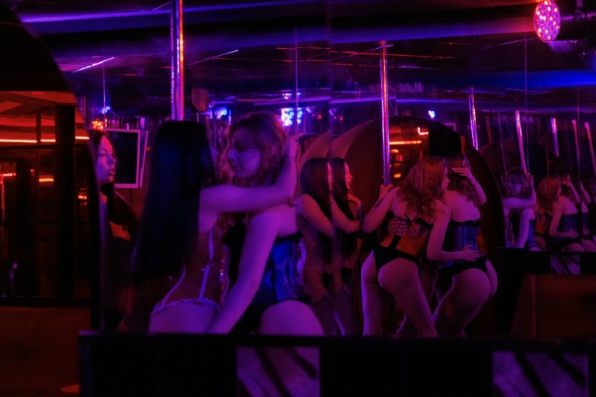 Dancers perform at the strip club 'Flash Dancers' in Kharkiv amid the Russian invasion