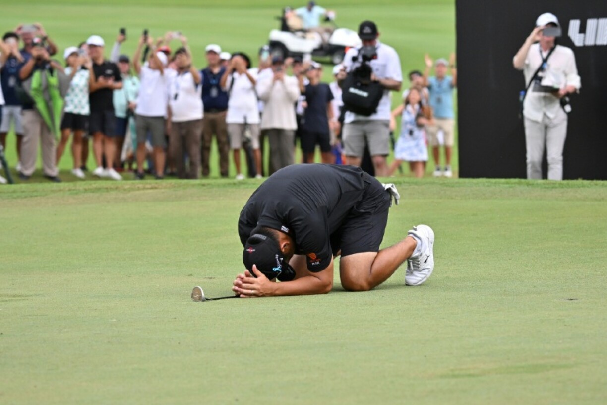 Emotional win: Miguel Tabuena collapses in tears on the 18th green at Sta. Elena Golf Club after winning the International Series Philippines in front of his home crowd
