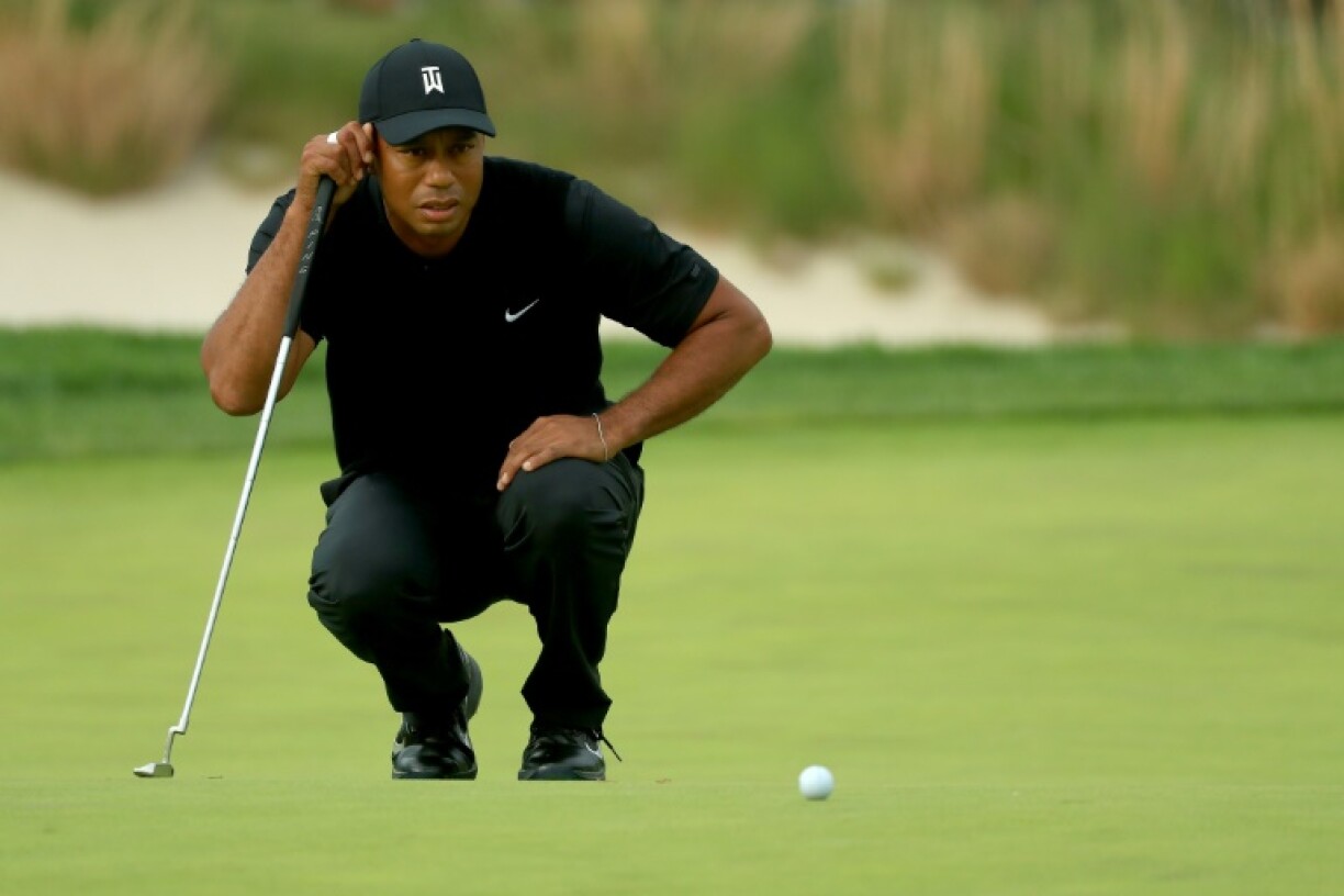Tiger Woods played an April Fool's joke on golf fans, posting a social media message he had recovered from injury and would play in next week's Masters only to post another message saying his ruptured tendon