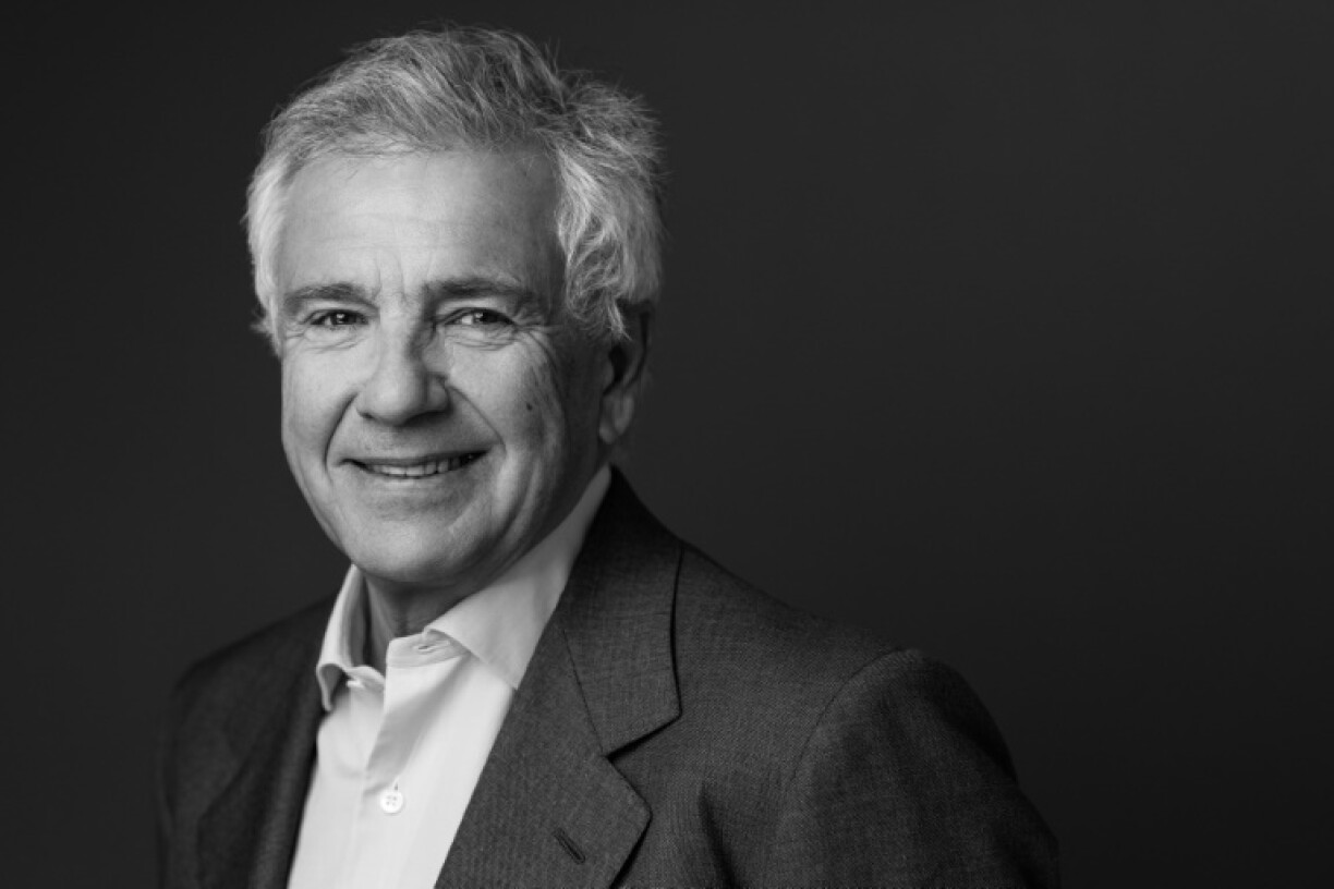 Urbane and successful banker Juan Antonio Samaranch Junior bids to make history by following in his father's footsteps as IOC president