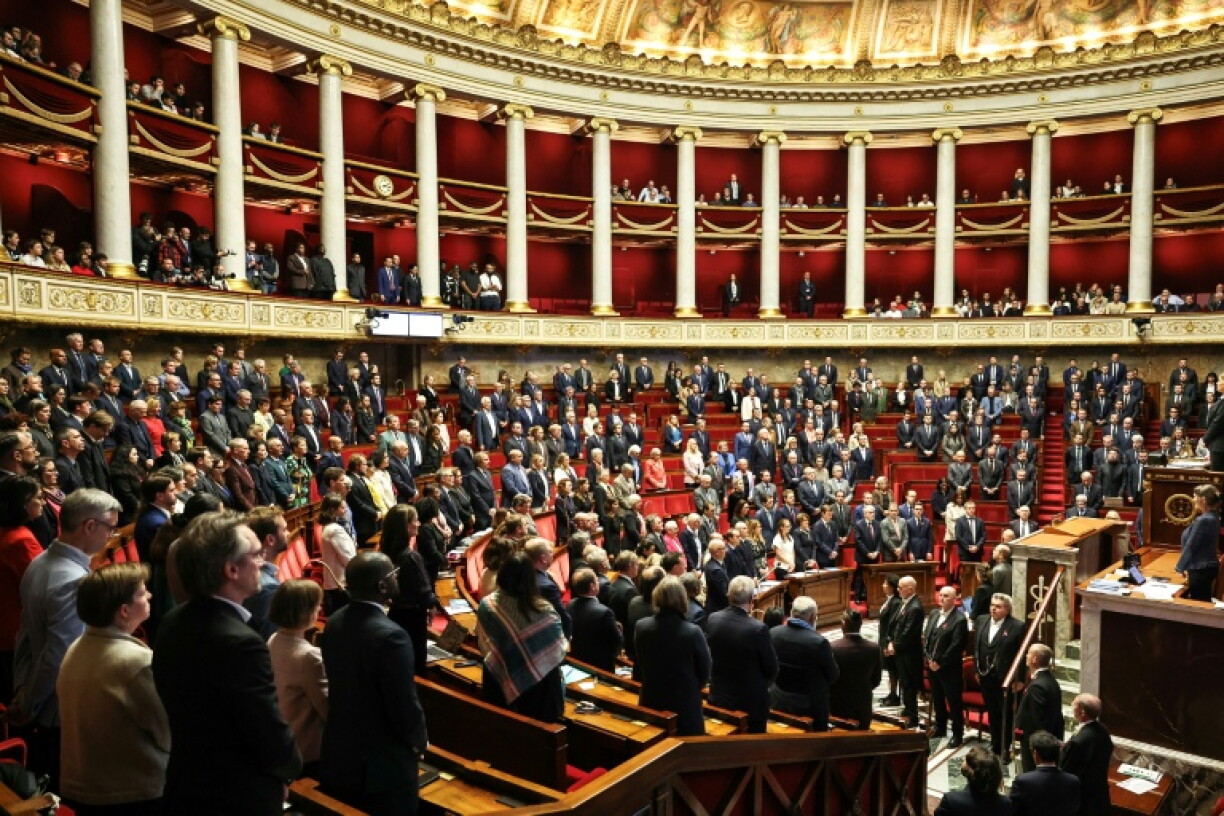 French lawmakers observed a minute of silence to pay tribute to the victims of last week's shooting attack