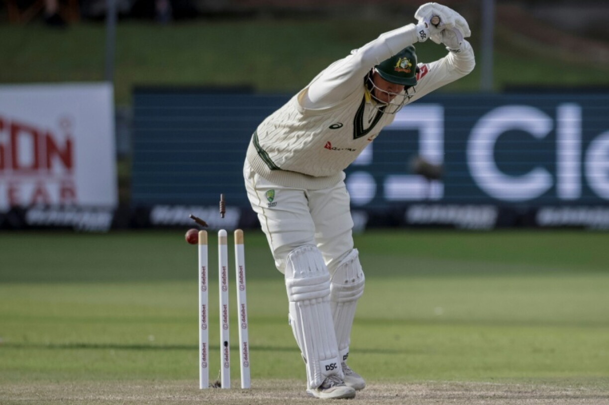 Australia's Matt Renshaw is bowled by South Africa's Kagiso Rabada
