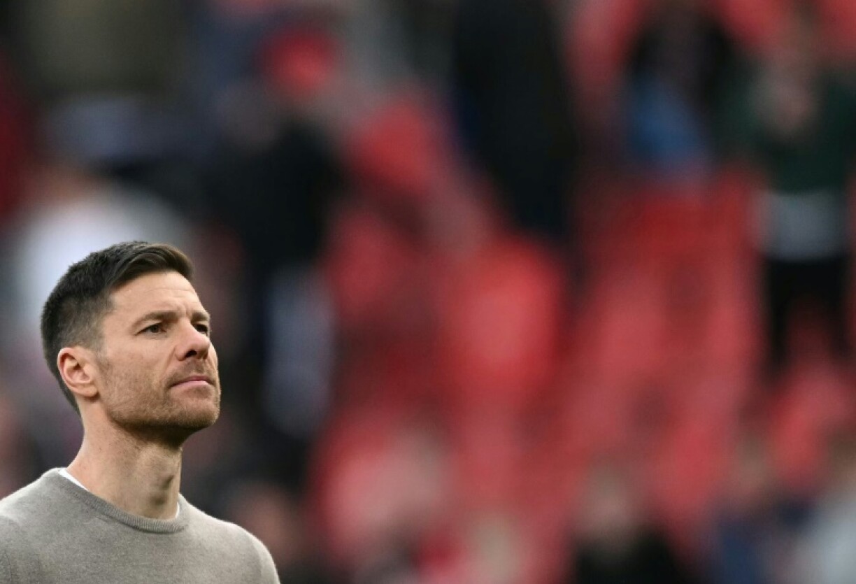 Bayer Leverkusen coach Xabi Alonso reacts after his side's loss to Werder Bremen