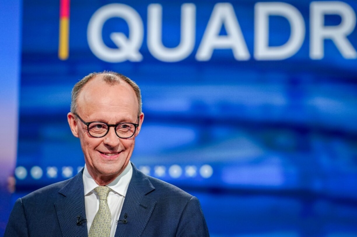Friedrich Merz, main candidate of the Christian Democratic Union (CDU), in the TV studio holding Sunday's four-way debate
