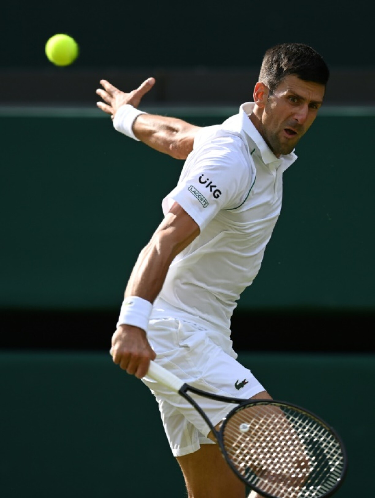 Le Serbe Novak Djokovic face à l'Américain Denis Kudla au 3e tour de Wimbledon, le 2 juillet 2021