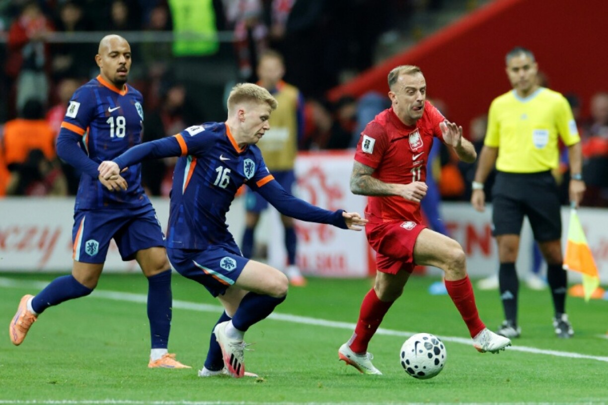 The Netherlands are on the brink of World Cup qualification after a 1-1 draw in Poland