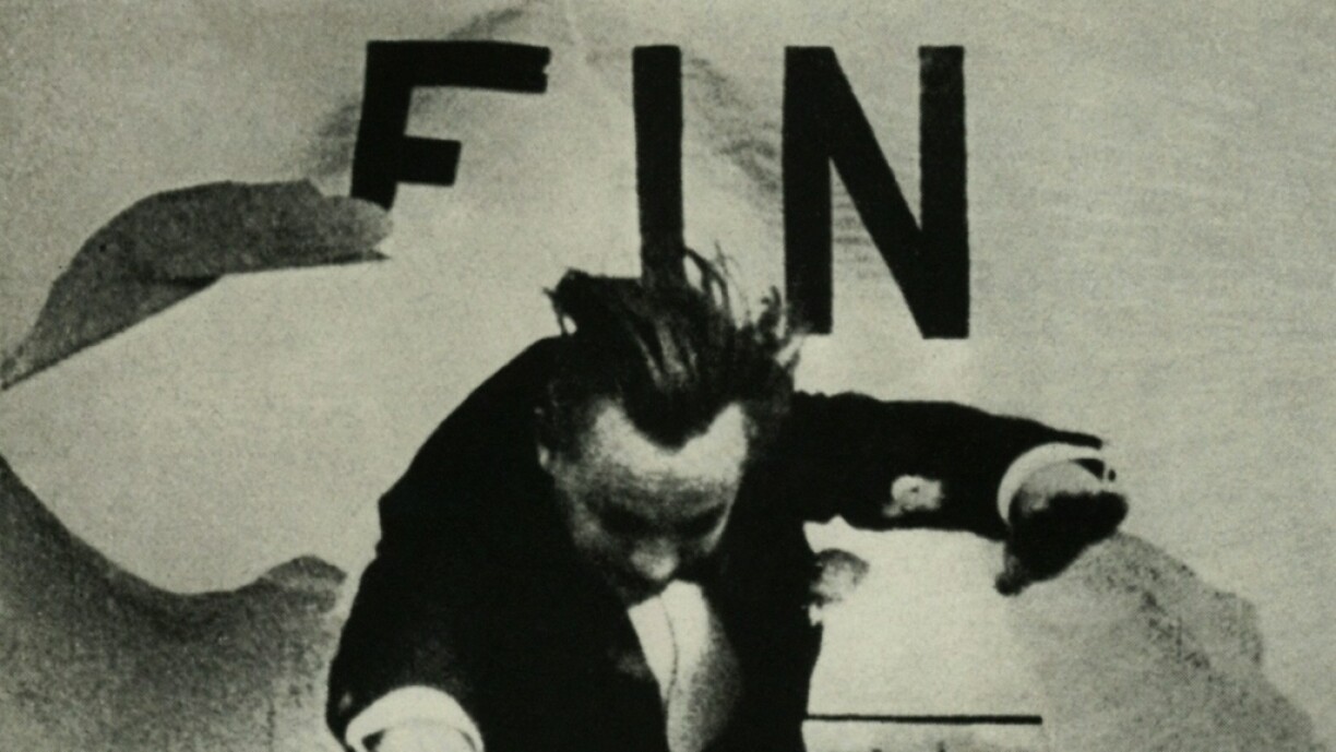 Screen capture of French film director René Clair's Entr'acte (1924). The short film does not seem to have a particular plot except for the pursuit of a rogue coffin, but counts as an avant-garde, dada masterpiece. What you're seeing here is the final scene in which a man rips through the end title card, self-referentially announcing the film's end.