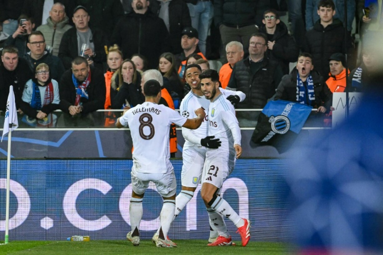 Marco Asensio (R) scored a late penalty to give Aston Villa a two-goal lead to defend in the second leg against Club Brugge