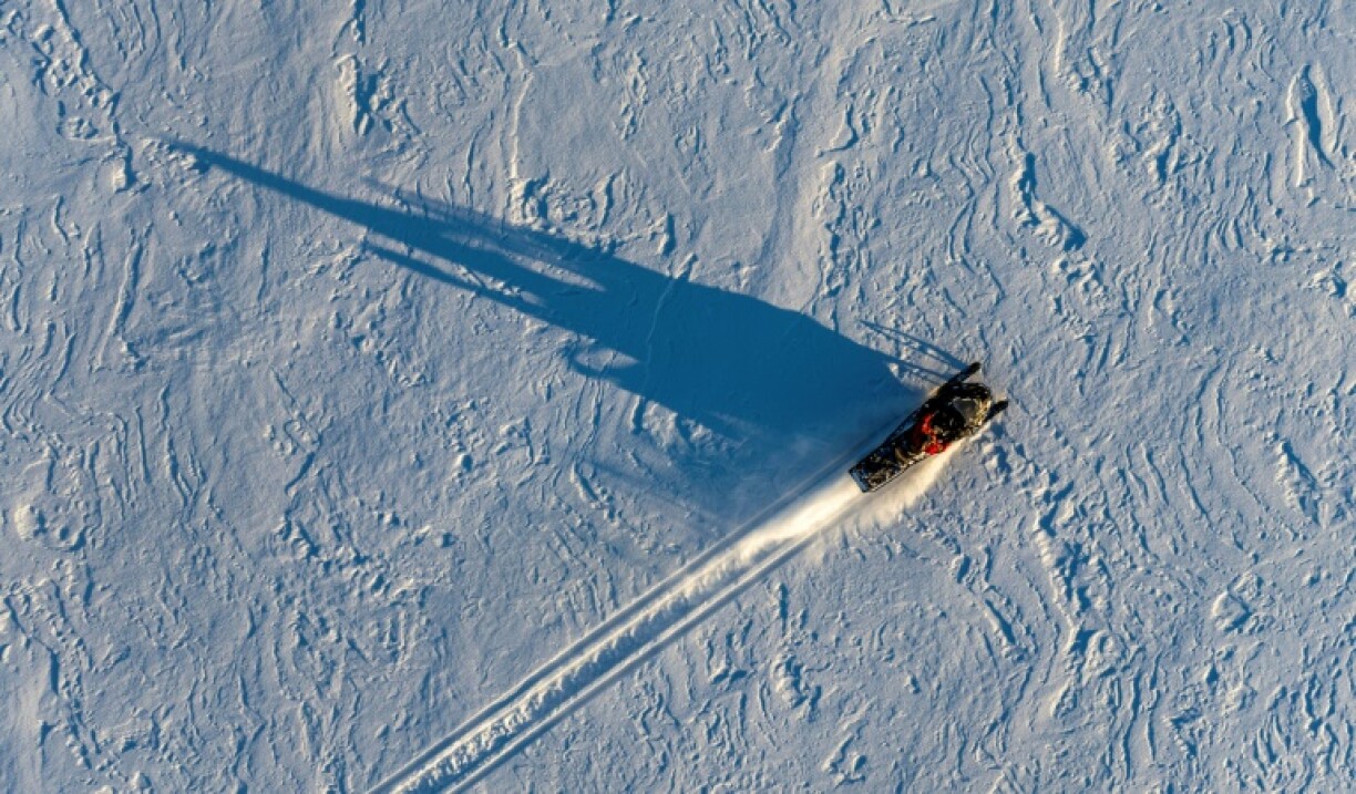 A Canadian Ranger rides a snowmobile in the surroundings of Yellowknife, Canada in January 2025