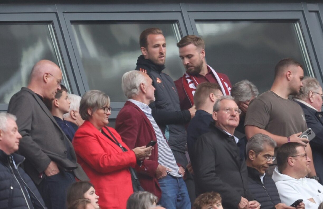 Harry Kane watches from the stands