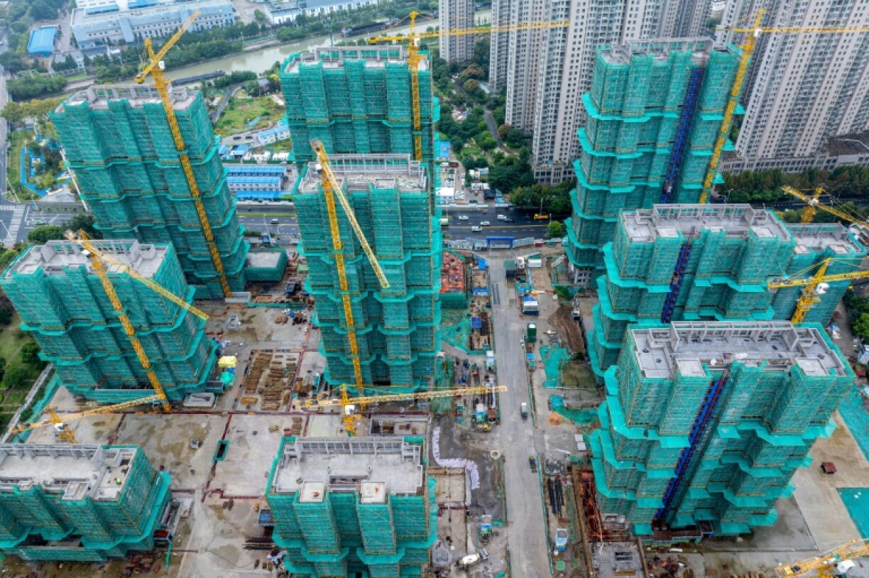 China's economy has been hit be weak consumer demand and a crisis in the vast property sector