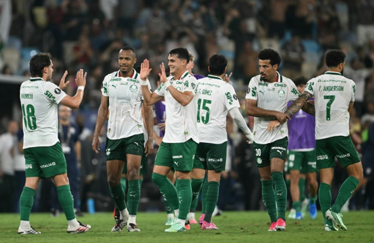 Palmeiras players celebrate after beating Fluminense in their Copa Libertadores semi-final first-leg match in Rio de Janeiro